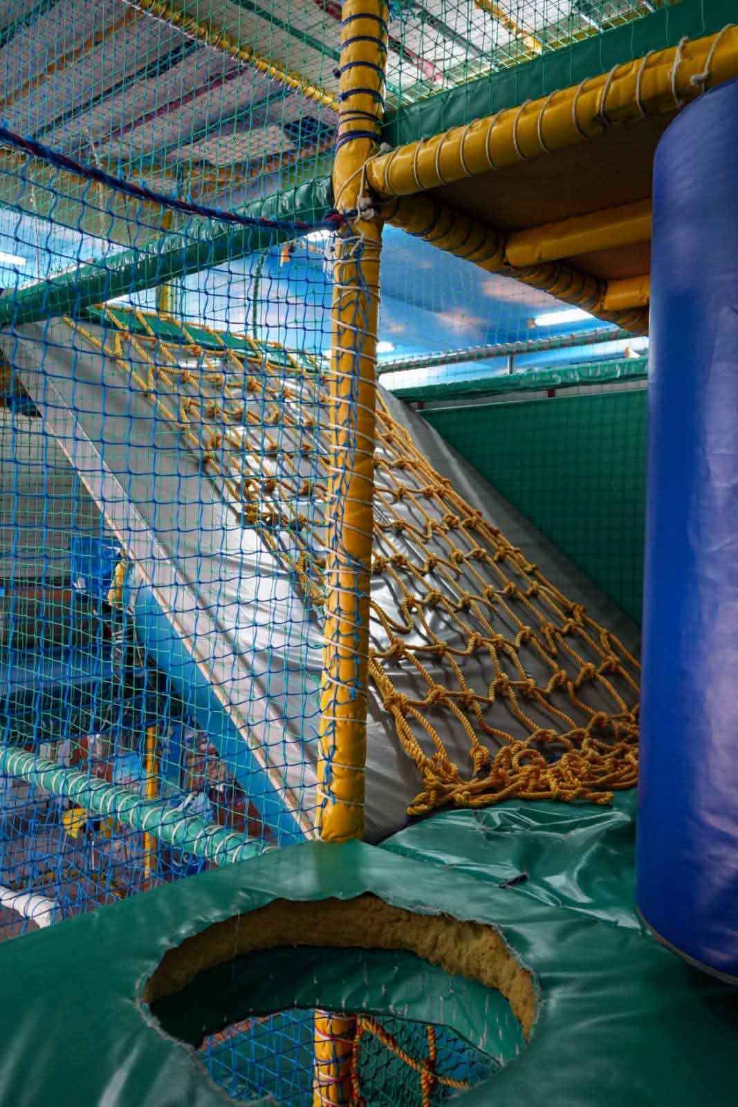 Rope climbing net and slide