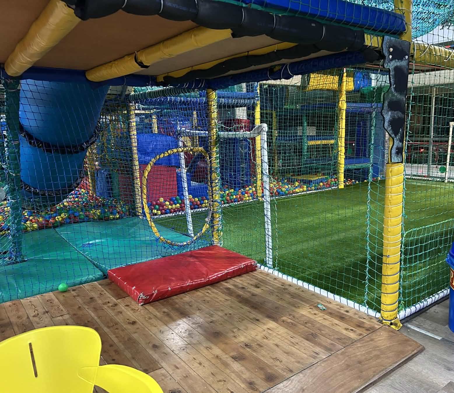 Indoor soft play area with ball pit and football pitch
